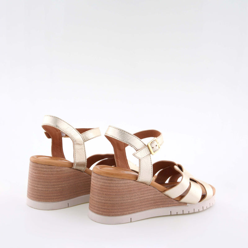 Women's gold leather heel sandal by AQA Shoes.