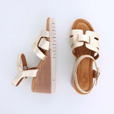 Women's gold leather heel sandal by AQA Shoes.