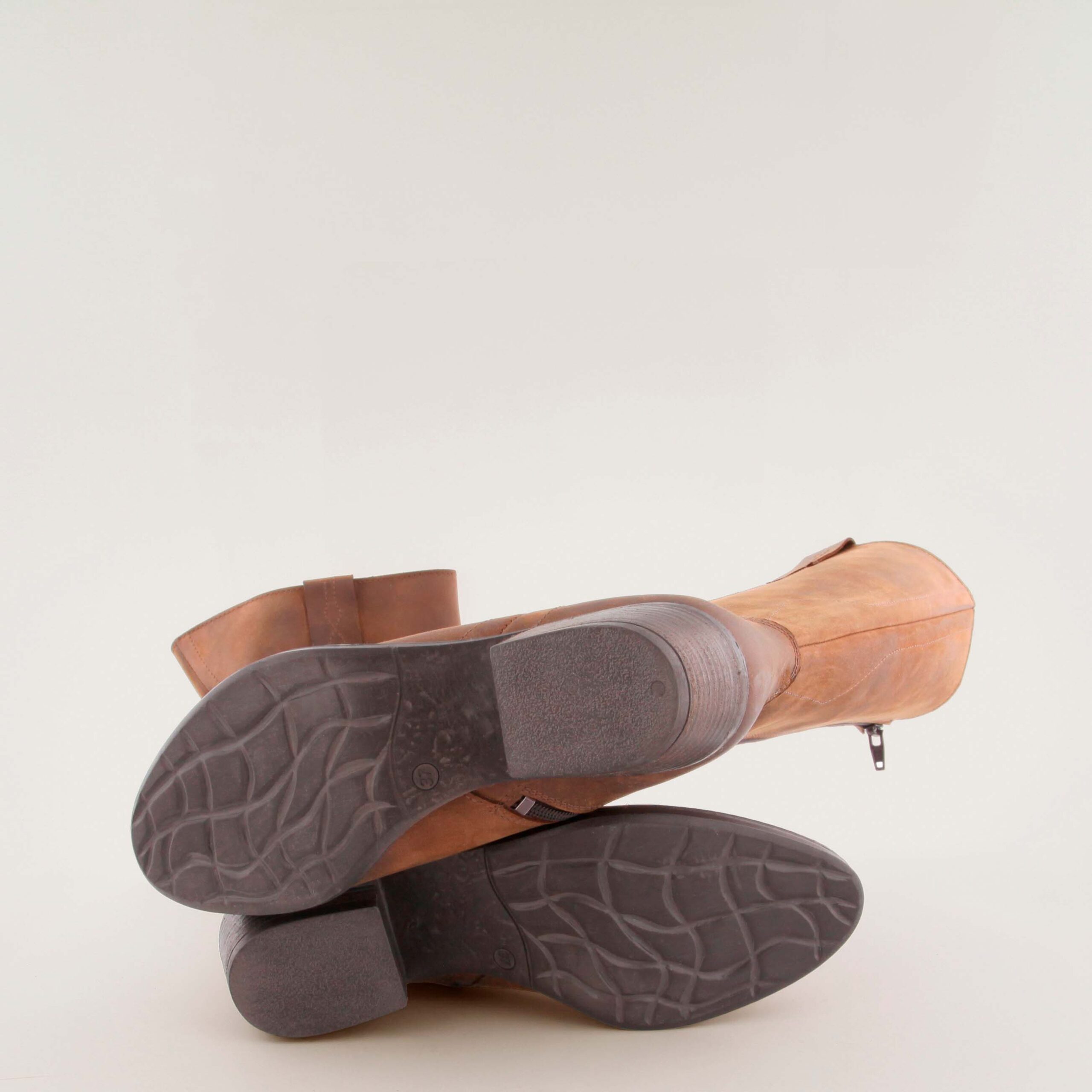 Brown leather knee-high boot, in an equestrian or cowboy style, featuring a stacked block heel.