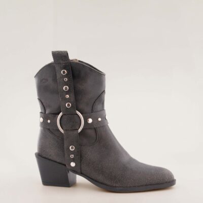 Black textured leather western-style ankle boot with metal ring and studded strap by AQA, model Sofia.